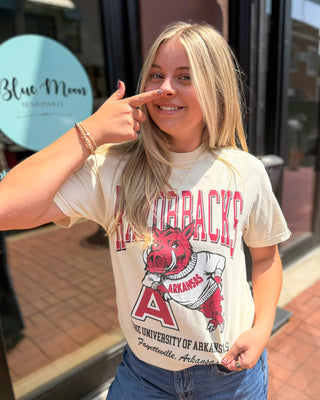 Cream Comfort Colors Razorback Vault T-shirt with vintage graphic, shown front and back on model