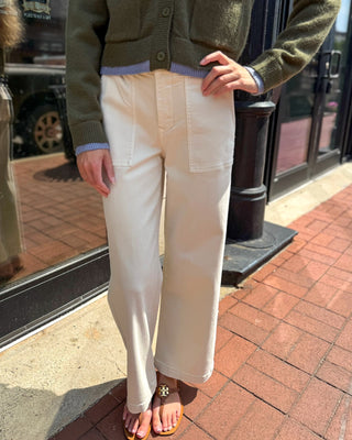 Ecru high-rise baggy wide leg jeans by Lovervet, shown front and back on model