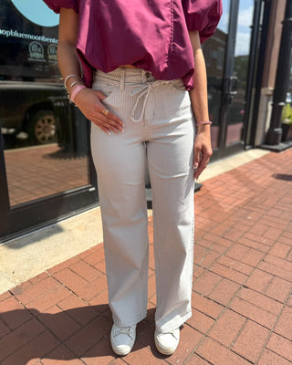 Cream and taupe striped wide leg jeans by Vervet, shown front, back, and detail views on model