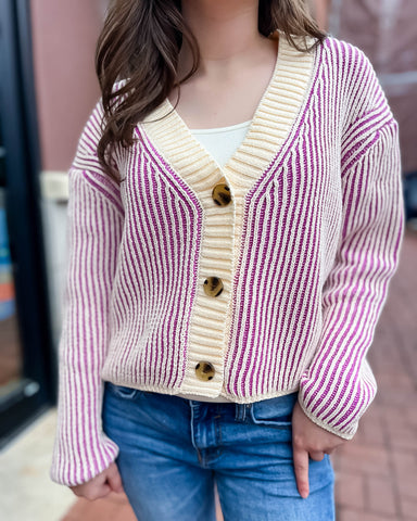 closeup picture of orchid striped cardigan