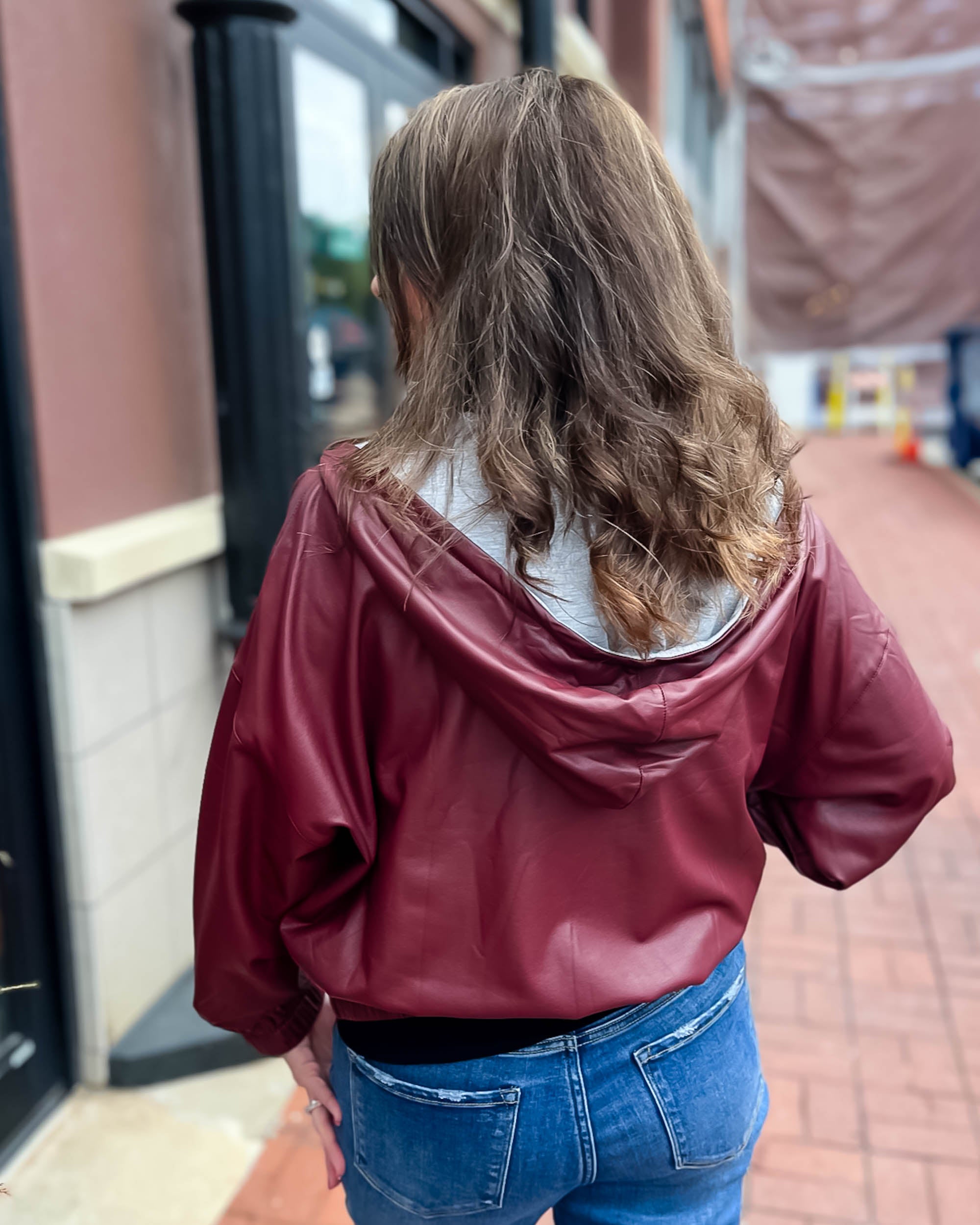 back of wine faux leather hoodie jacket