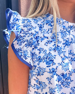 Blue Floral Top w/Ruffle Cap Sleeves - Shopbluemoonbentonville