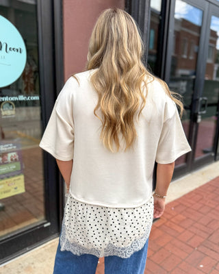 Ecru Top w/Polka Dot Lace Contrast Hem - Blue Moon Bentonville