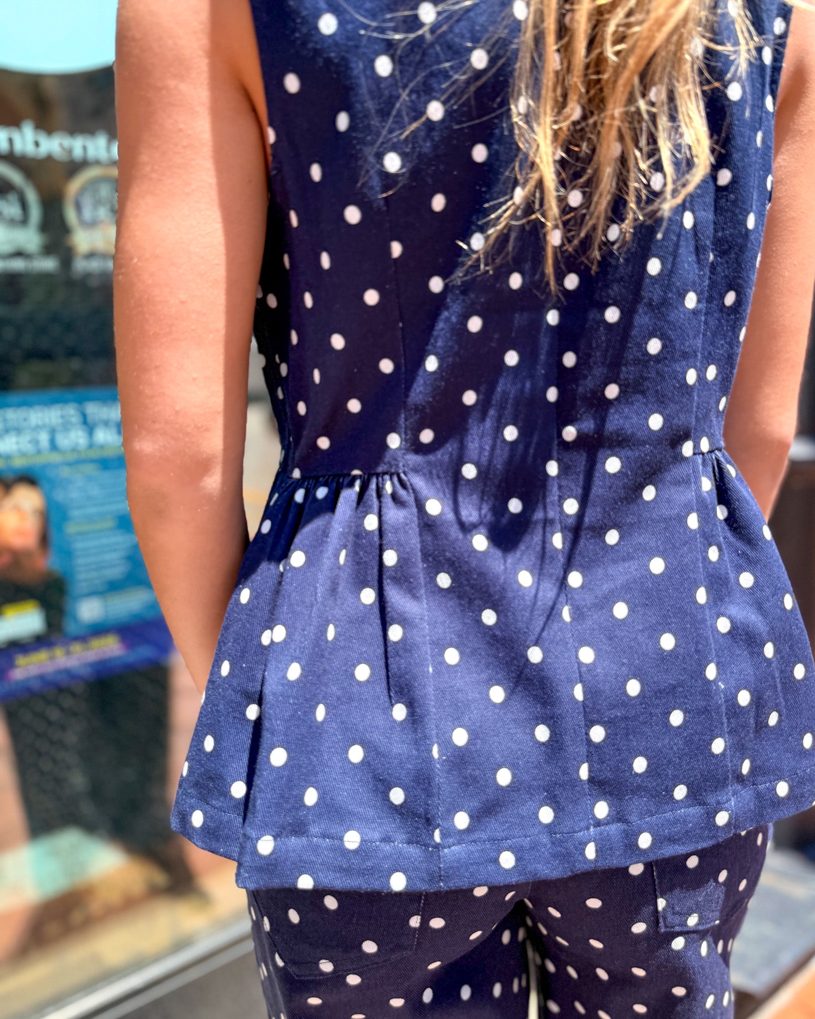 Entro Navy Polka Dot Peplum Top - Shopbluemoonbentonville