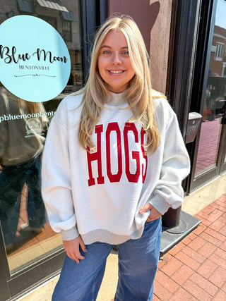 Grey reversible Razorbacks sweatshirt with dual-wear design, shown front and back, casual fan style