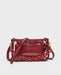Red handbag with clear section and chain detail on a light gray background