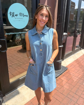 Light wash sleeveless denim shirt dress by Entro, shown front and back on model