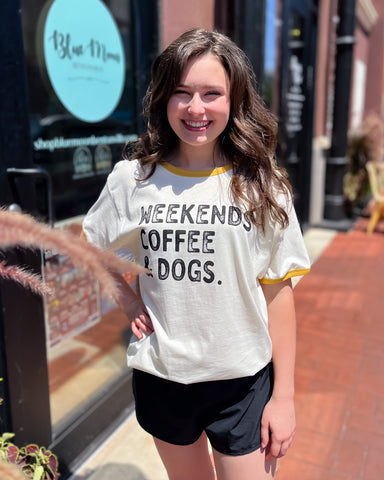 girl in weekends, coffee, & dogs ringer t-shirt